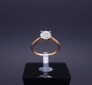 Gold ring with zircons