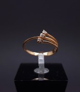 Gold ring with zircons