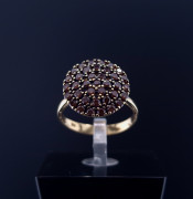 Gold ring with colored stones