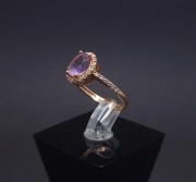 Gold ring with colored stones