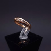 Gold ring with zircons