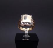 Gold ring with zircons