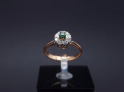 Gold ring with diamonds and colored stone