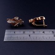 Gold earrings with zircons 