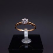 Gold ring with zircons