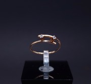 Gold ring with zircons