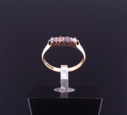 Gold ring with colored stones