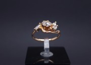 Gold ring with zircons