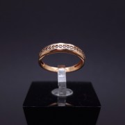 Gold ring with zircons