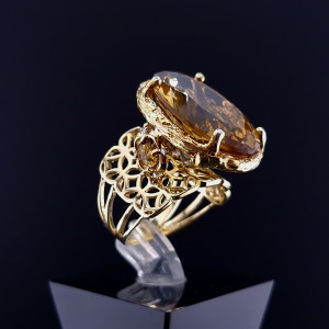 Gold ring with colored stones