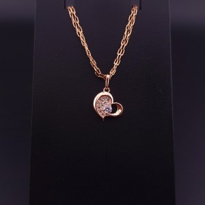 Gold pendant with zircons