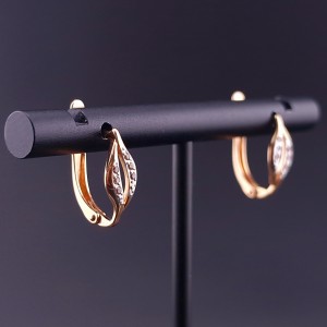 Gold earrings with zircons 