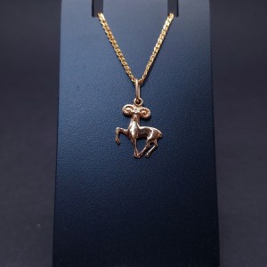 Gold pendant "Aries"