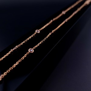 Gold chain  with colored stones