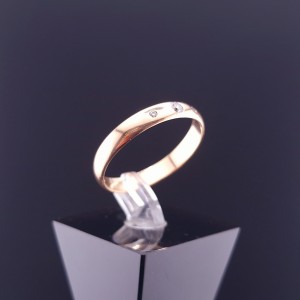 Gold wedding ring with diamonds