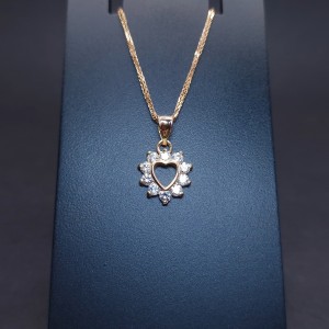 Gold pendant with zircons