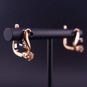 Gold earrings with zircons 