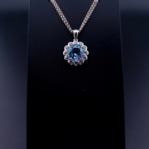 Gold pendant with colored stones