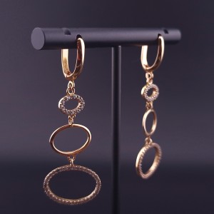 Gold earrings with zircons 