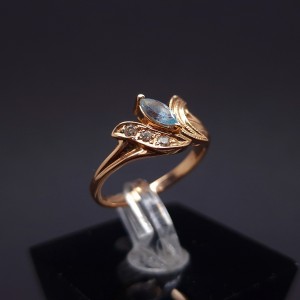 Gold ring with diamonds and colored stone