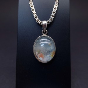 Silver pendant with colored stone
