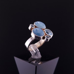 Silver ring with colored stones