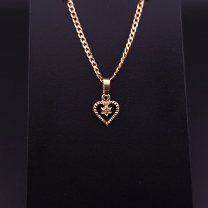 Gold pendant with zircon