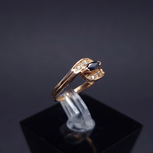 Gold ring with diamonds and sapphire