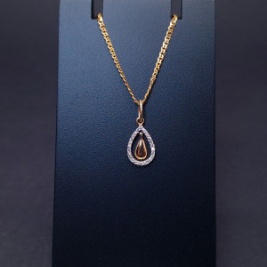 Gold pendant with zircons