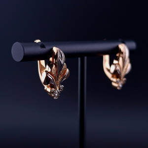 Gold earrings with zircons 