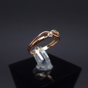 Gold ring with zircons