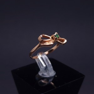 Gold ring with colored stone