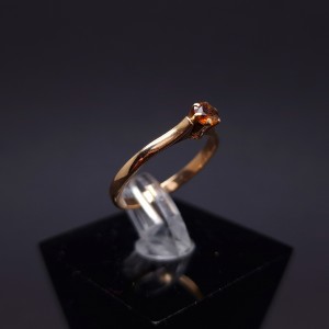 Gold ring with orange topaz