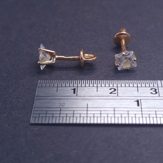 Gold earrings with zircons 