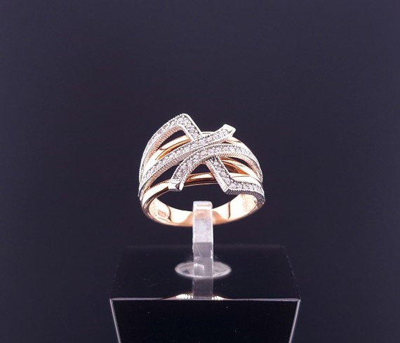 Gold ring with zircons