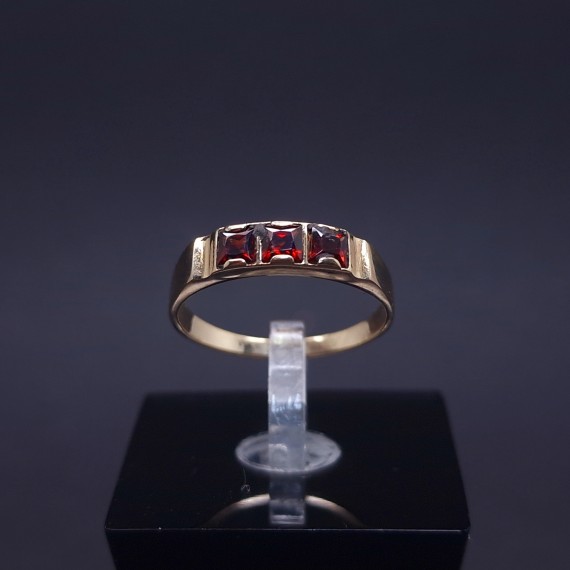 Gold ring with colored stones