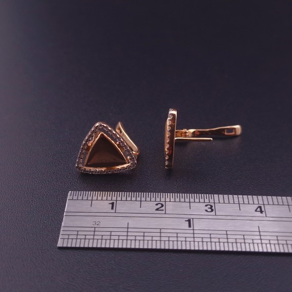 Gold earrings with zircons 