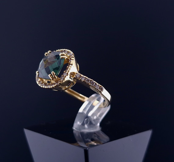 Gold ring with colored stones