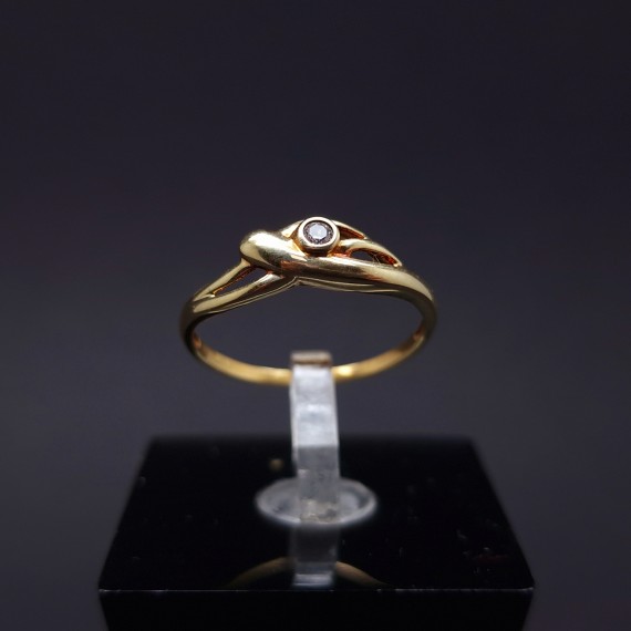 Gold ring with zircon