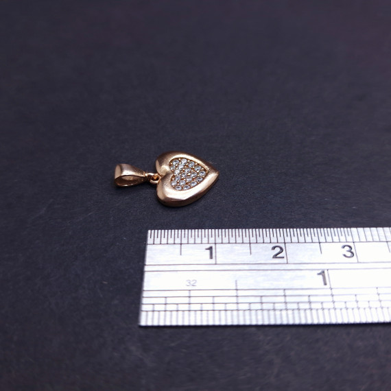 Gold pendant with zircons