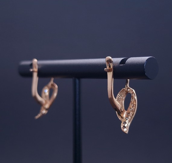 Gold earrings with zircons 