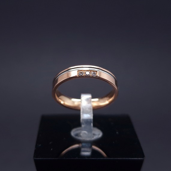 Gold wedding ring with diamonds