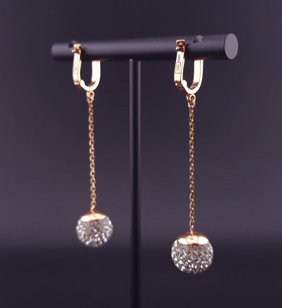 Gold earrings with zircons 