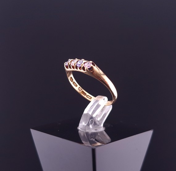 Gold ring with colored stones