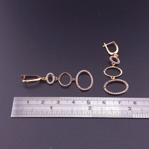 Gold earrings with zircons 