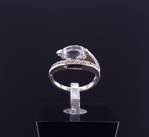 Gold ring with diamonds and zircon