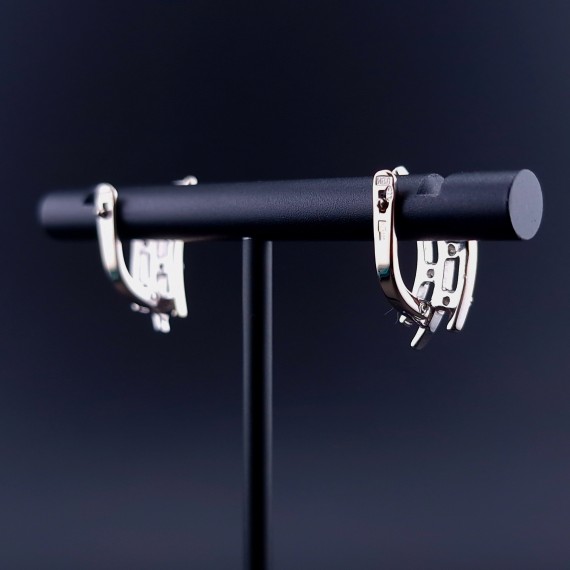 Gold earrings with zircons 