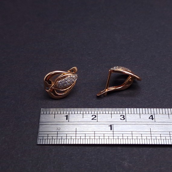 Gold earrings with zircons 