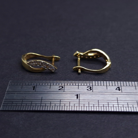 Gold earrings with zircons