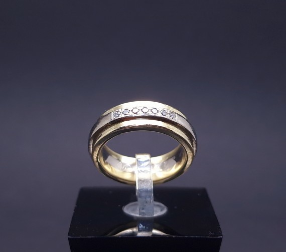 Gold wedding ring with diamonds